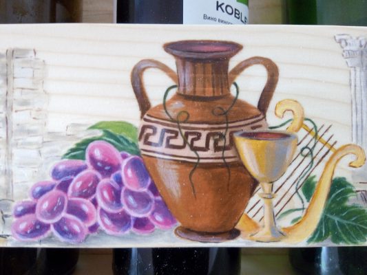 Ancient Greek harp with wine
